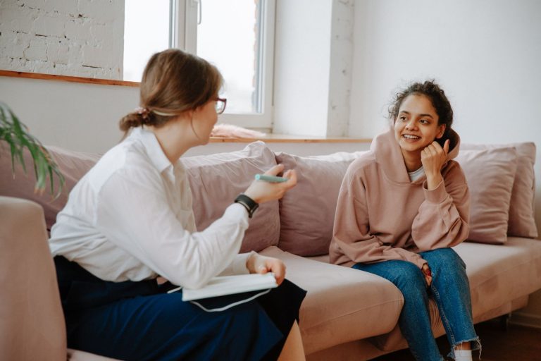 A psychologist and a young person talking