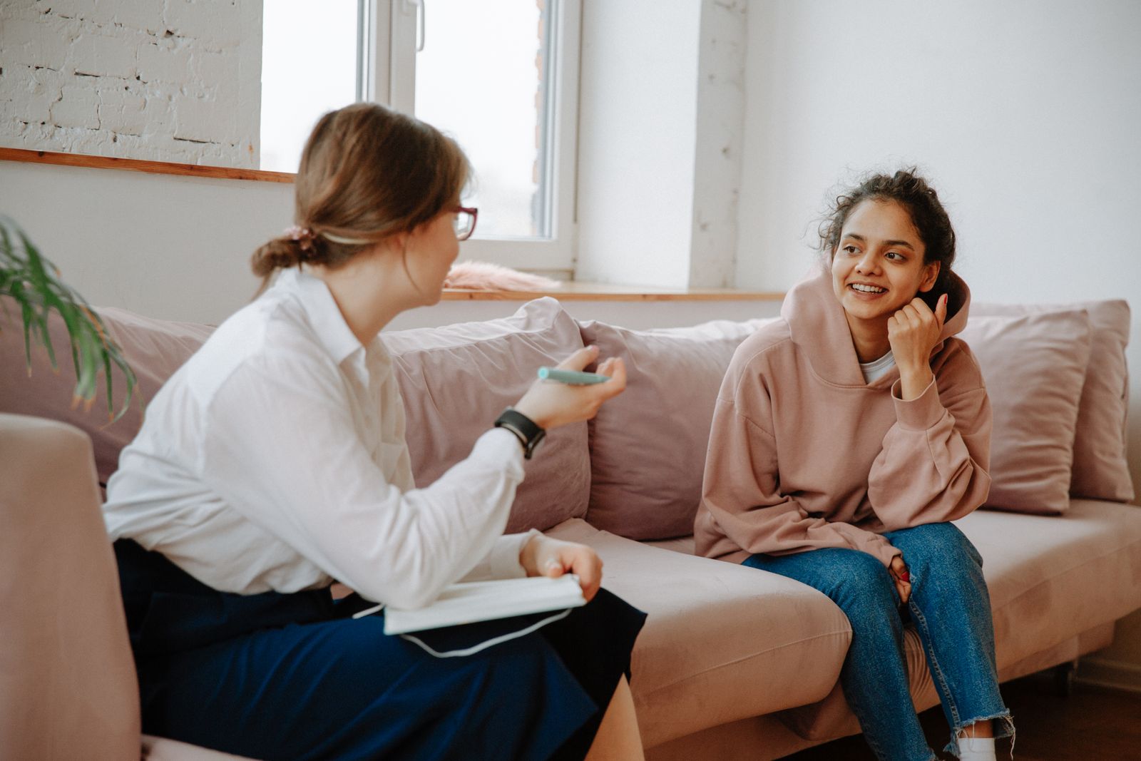 A psychologist and a young person talking